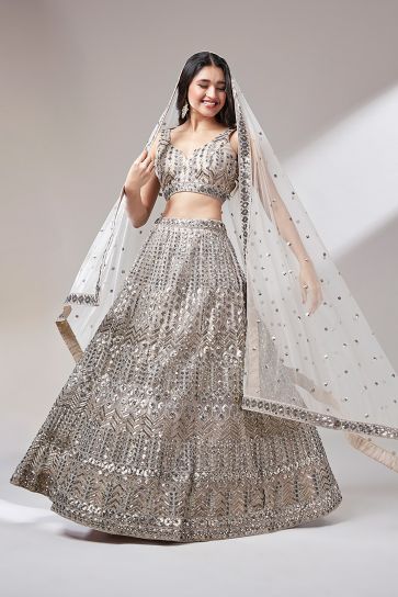 Occasion Wear Beige Color Sequins Work Lehenga In Net Fabric With Designer Blouse