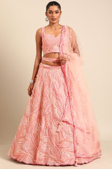 Occasion Wear Lehenga Choli In Pink Net Fabric With Sequins Work