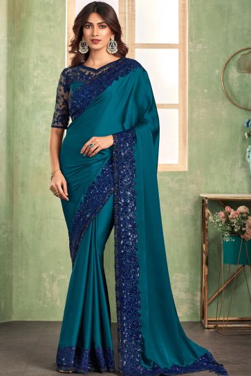 Excellent Silk Fabric Teal Blue Color Saree With Border Work 