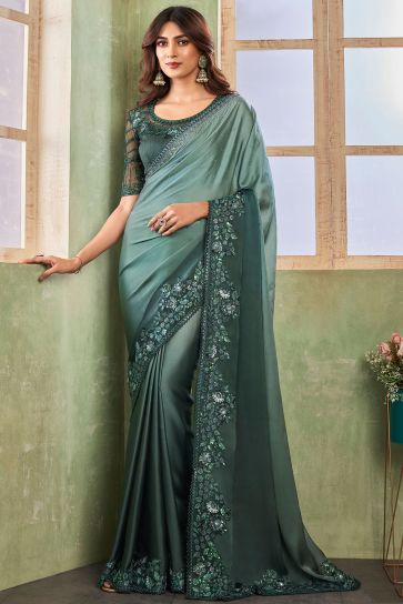 Entrancing Silk Fabric Saree In Teal Green Color With Border Work