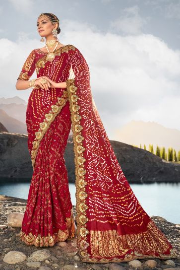 Beguiling Maroon Color Satin Pure Gajji Bandhani Saree With Heavy Embroidered Silk Blouse