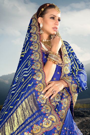 Tempting Satin Blue Color Pure Gajji Bandhani Saree With Heavy Embroidered Silk Blouse