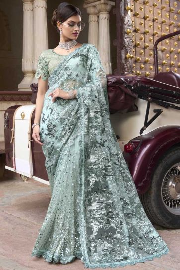 Sea Green Color Net Fabric Gorgeous Saree With Sequins Work