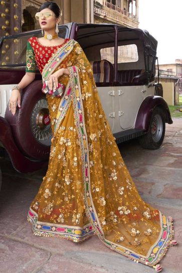 Mustard Color Sequins Work On Attractive Saree In Net Fabric