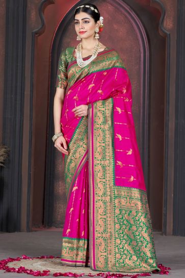 Alluring Rani Color Weaving Work Function Wear Silk Saree