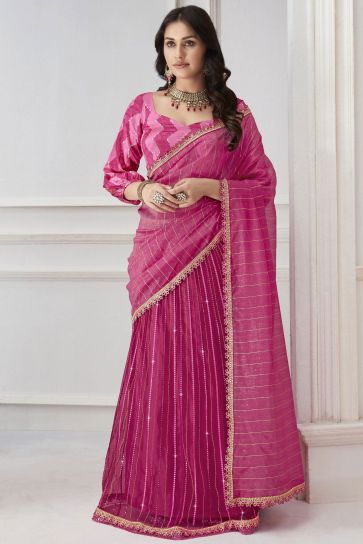 Organza And Net Fabric Rani Color Pleasance Saree With Embroidered Work