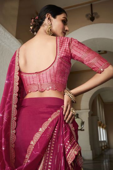 Exclusive Organza Fabric Rani Color Saree With Embroidered Designer Blouse