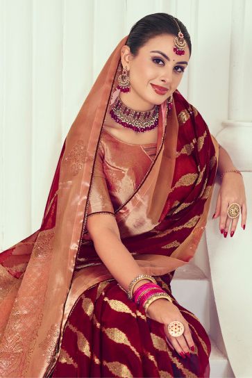 Maroon Color Engrossing Weaving And Stone Work Saree In Organza Fabric