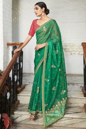 Embroidered And Stone Work Party Style Luxurious Organza Saree In Green Color