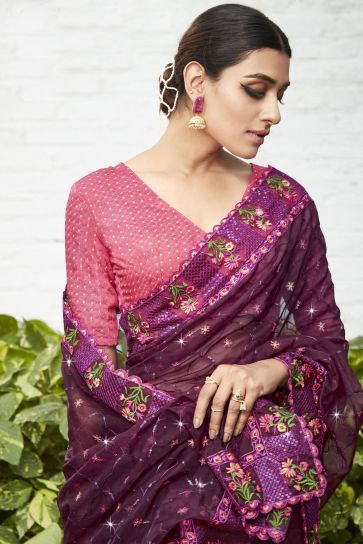 Party Style Embroidered And Stone Work Wine Color Supreme Organza Saree