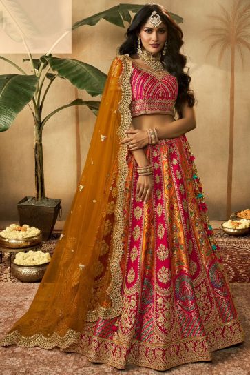 Silk Fabric Heavy Embroidered Bridal Lehenga Choli In Multi Color