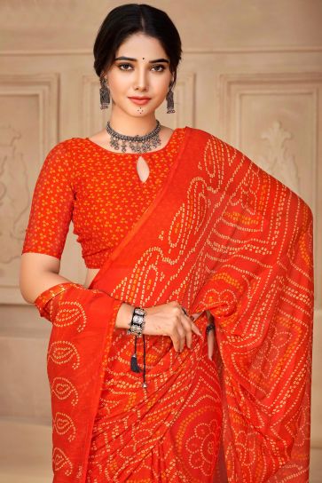 Chiffon Fabric Orange Color Fancy Bandhani Print Casual Saree