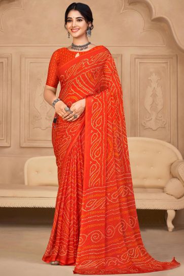 Chiffon Fabric Orange Color Fancy Bandhani Print Casual Saree
