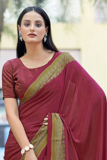 Charming Maroon Color Crepe Silk Fabric Casual Saree With Border Work