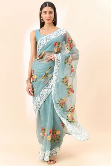 Heavy Organza Fabric Embroidered On Cyan Color Saree