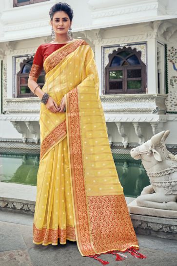 Organza Fabric Yellow Color Festival Wear Saree With Intricate Weaving Work