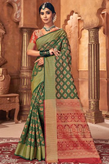 Creative Jacquard Work On Green Color Art Silk Fabric Festival Wear Patola Style Saree