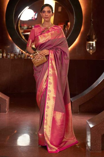 Mesmeric Rani Color Weaving Work On Saree In Art Silk Fabric