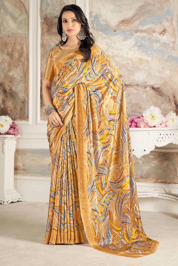 Soothing Printed Work On Mustard Color Crepe Silk Fabric Saree
