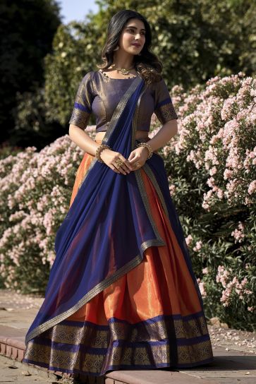 Function Wear Orange Color Kanchipuram With Zari Weaving Lovely Lehenga In Art Silk Fabric