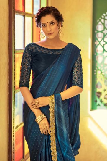 Fancy Fabric Teal Color Party Wear Riveting Saree With Embroidered Blouse