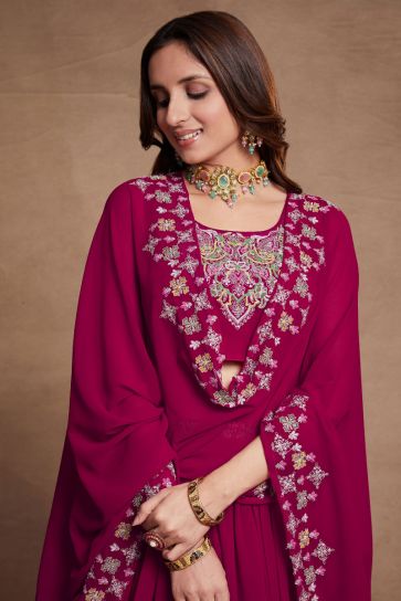 Georgette Fabric Embroidered Sangeet Wear Lehenga Choli In Rani Color