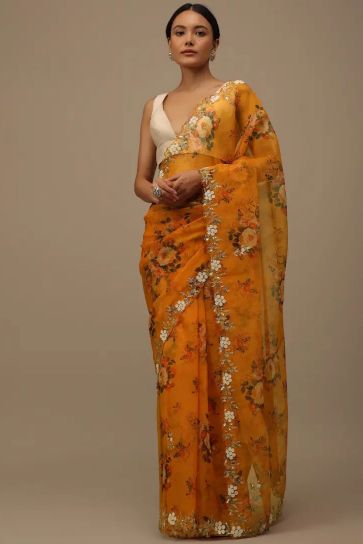 Mustard Color Organza Fabric Adroit Floral Printed Saree