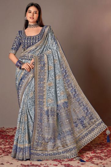 Grey Color Graceful Silk Saree With Heavy Embroidered Velvet Blouse