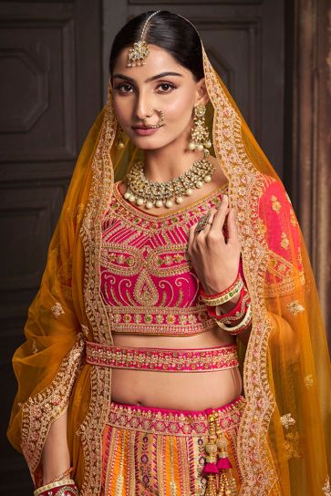 Excellent Silk Fabric Mustard Color Bridal Lehenga With Embroidered Work