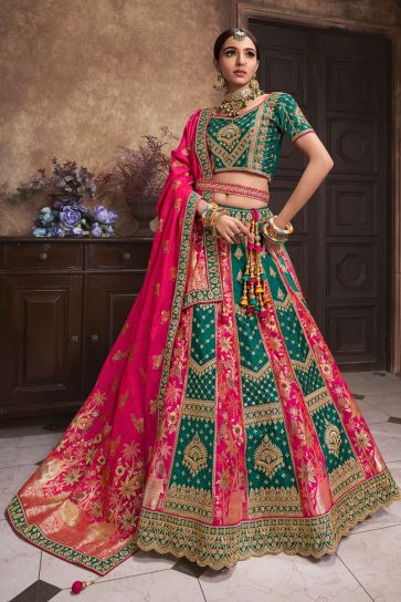 Tempting Silk Fabric Green Color Bridal Lehenga With Embroidered Work