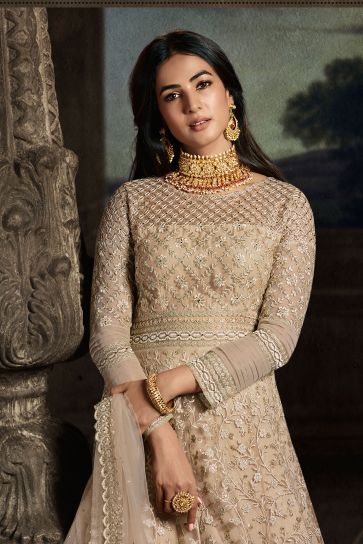 Sonal Chauhan Dazzling Net Fabric Beige Color Wedding Wear Anarkali Suit