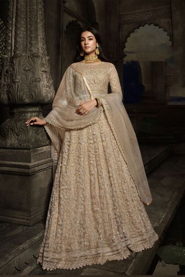 Sonal Chauhan Dazzling Net Fabric Beige Color Wedding Wear Anarkali Suit