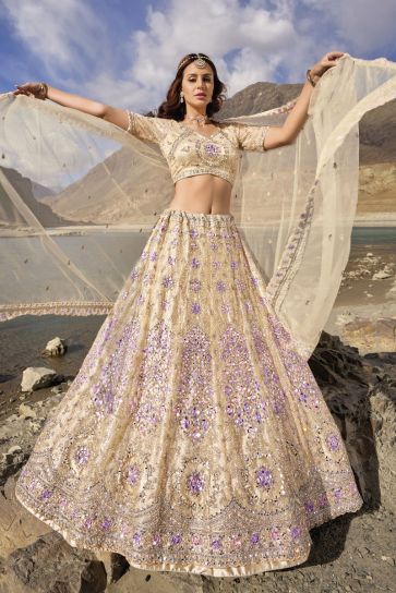 Fancy Work Beige Color Bridal Lehenga Choli In Net Fabric