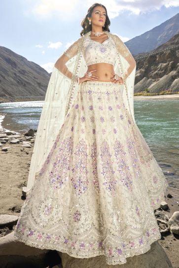 Beige Color Designer Bridal Lehenga Choli With Fancy Work Net Fabric