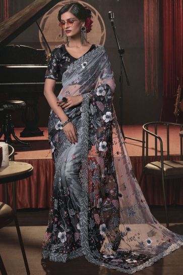 Delicate Grey Color Heavy Embroidery Work Net Saree With Party Look Blouse