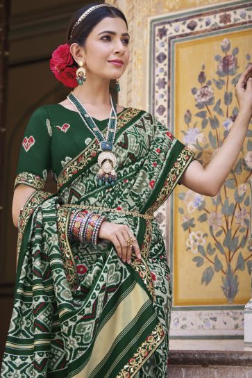 Alluring Green Color Printed Patola Silk Saree