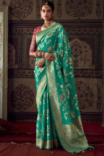 Exclusive Weaving Work Cyan Color Fancy Fabric Saree