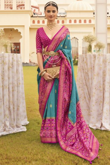 Attractive Cyan Printed Patola Silk Traditional Saree