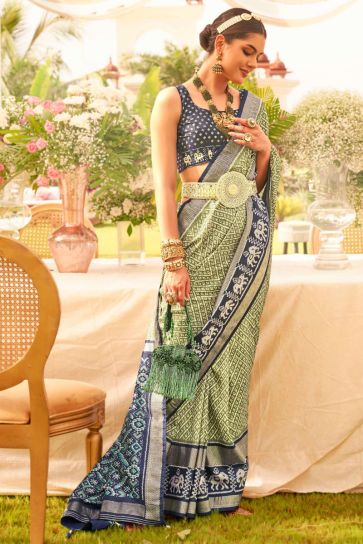 Glorious Look Art Silk Fabric Sea Green Color Printed Patola Saree