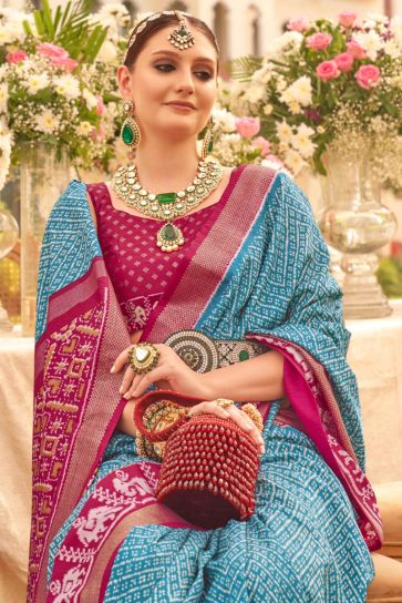 Cyan Color Art Silk Fabric Charming Look Printed Patola Saree