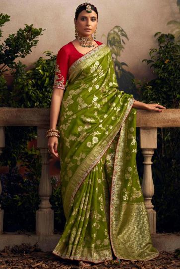 Traditional Look Green Color Dola Silk Fabric Weaving Work Saree With Contrast Blouse