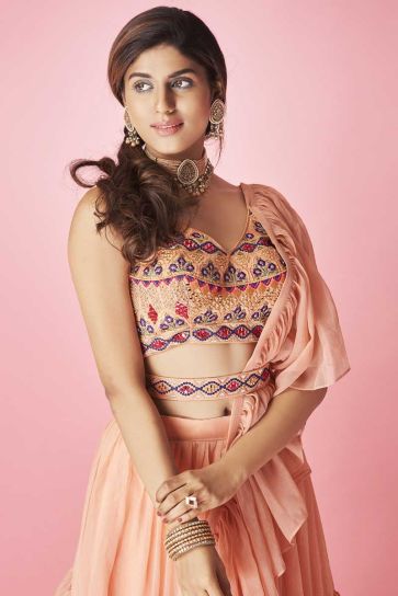 Chiffon Fabric Sangeet Wear Embroidered Work Beguiling Lehenga In Peach Color