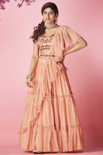 Chiffon Fabric Sangeet Wear Embroidered Work Beguiling Lehenga In Peach Color