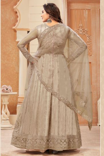 Stunning Beige Color Net Fabric Embroidered Anarklai Suit