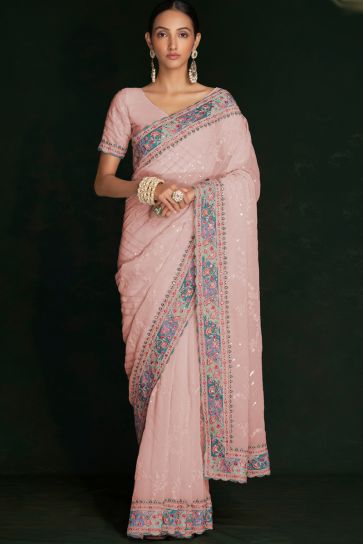 Glamorous Peach Georgette Saree with Beautiful Lucknowi Work