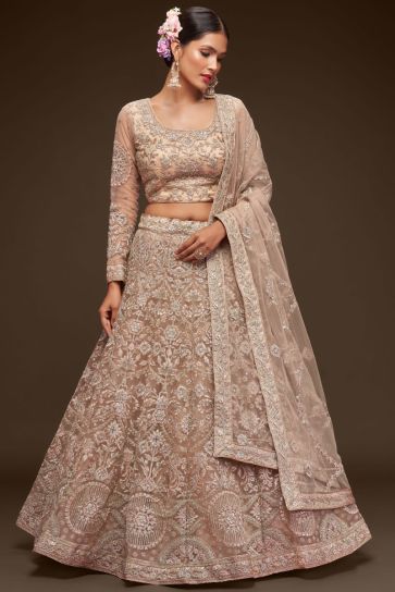 Net Fabric Beige Color Lehenga With Winsome Embroidered Work