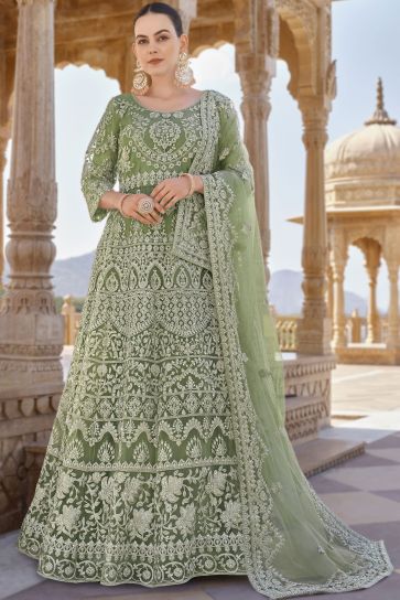 Attractive Net Fabric Green Color Anarkali Suit With Embroidered Work