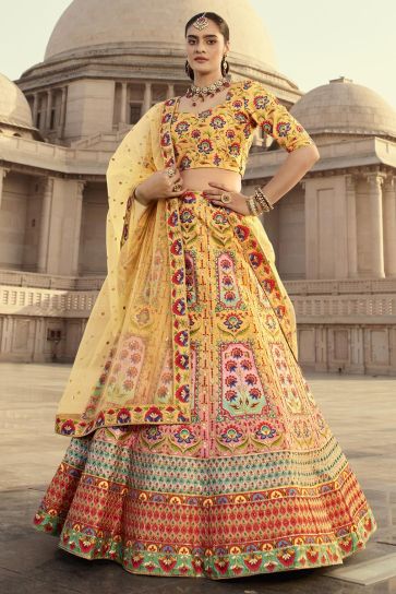 Yellow Color Art Silk Fabric Glorious Sangeet Wear Lehenga With Embroidered Work