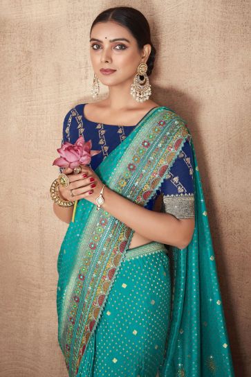 Cyan Color Weaving Work Silk Fabric Party Wear Saree With Designer Blouse