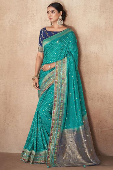 Cyan Color Weaving Work Silk Fabric Party Wear Saree With Designer Blouse